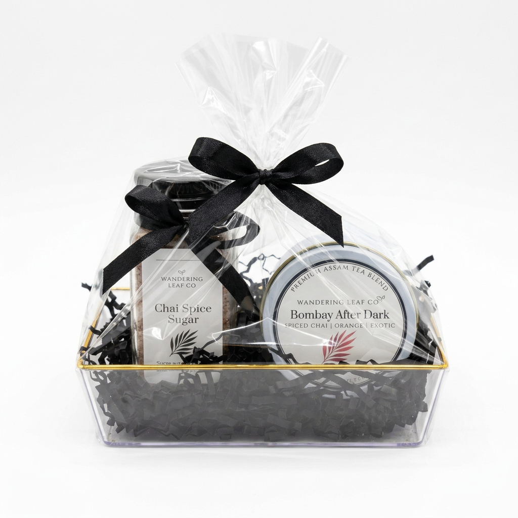 Gift set wrapped in clear cellophane with a black bow